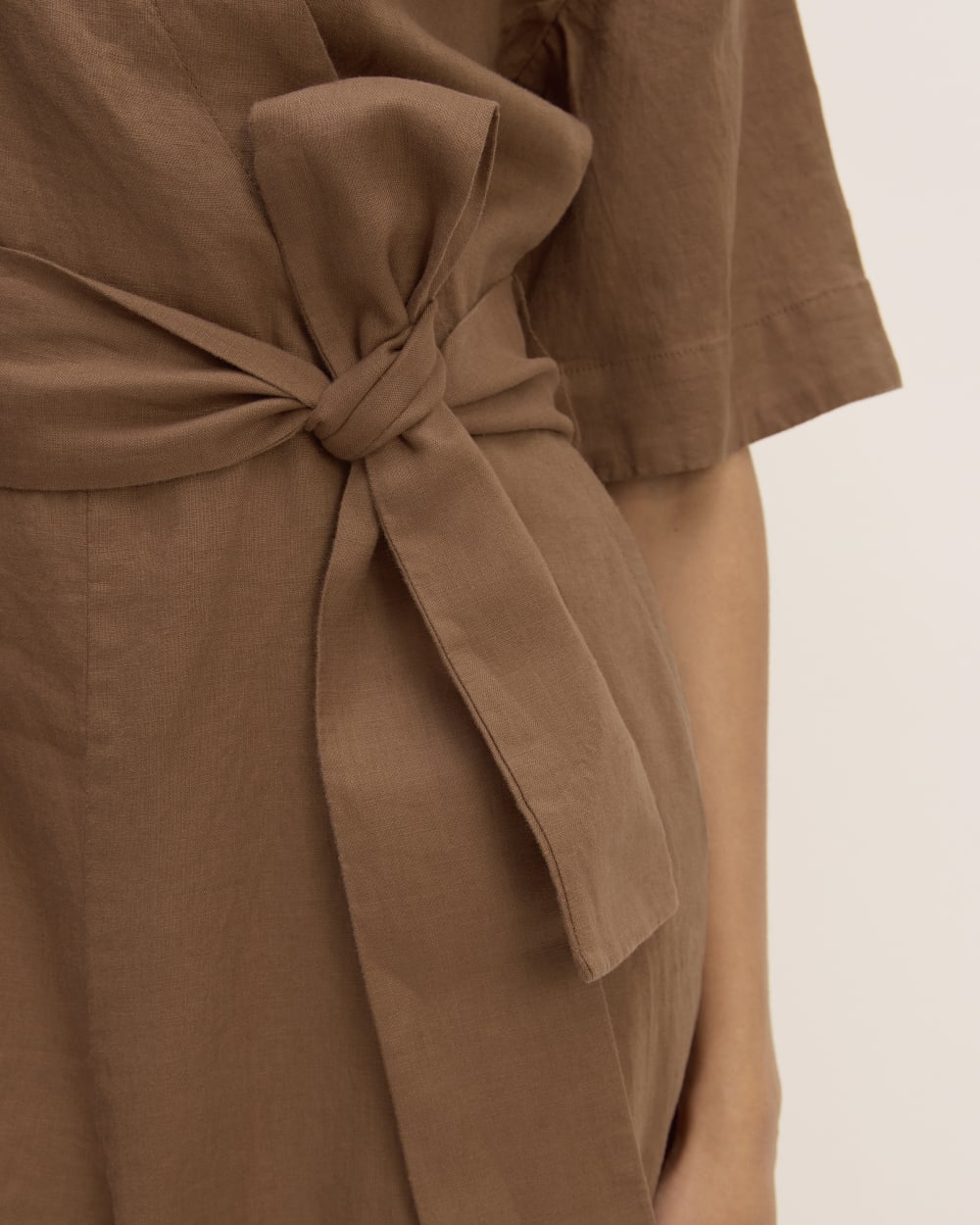 The Wrap Jumpsuit in Linen | Carob Brown - Image 4